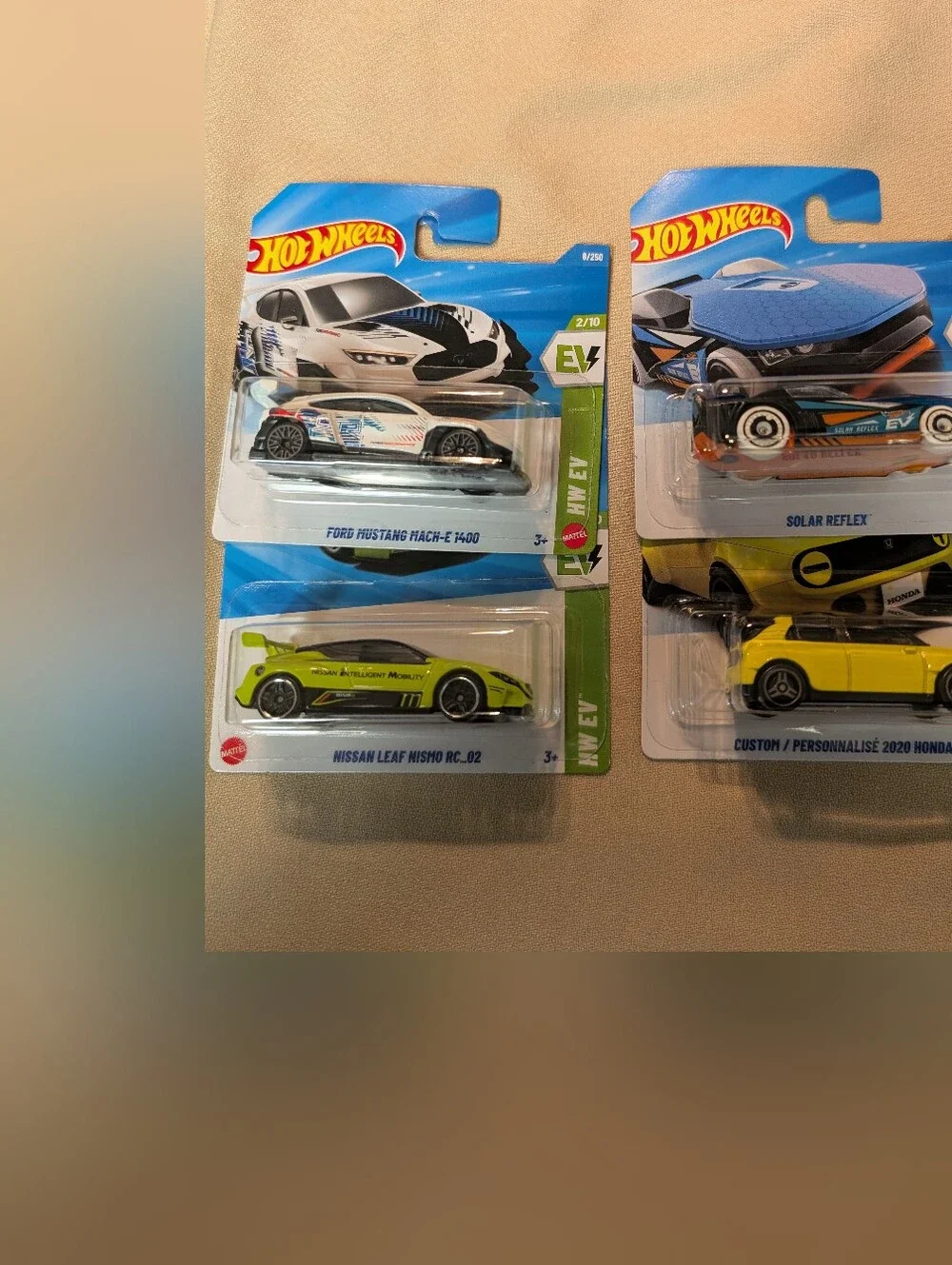 Lot Of 4 Hot Wheels EVs 1 Treasure Hunt